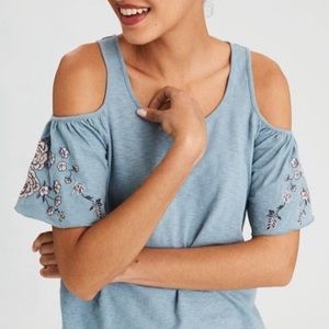 Cold shoulder shirt. Never worn